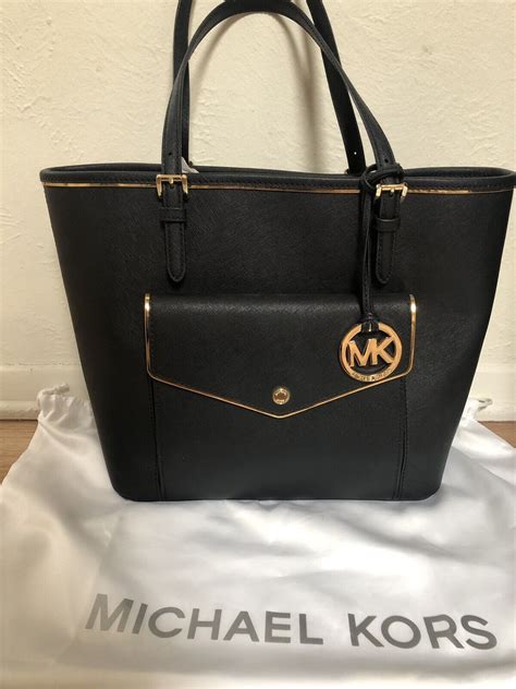 michael kors specchio large pocket tote|michael kors specchio jet set large pocket multifunction tote.